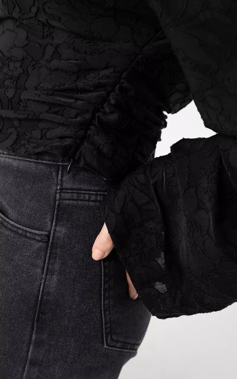 Top met structuur Zwart