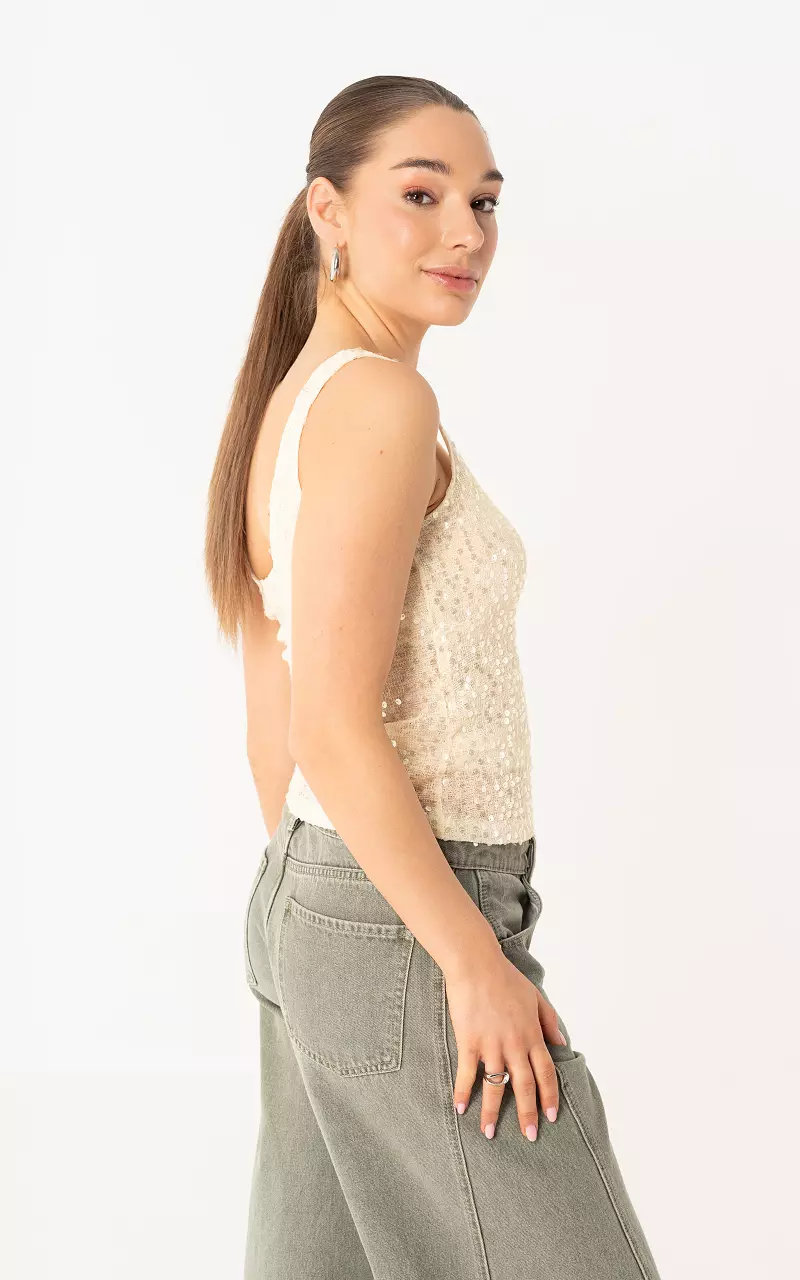 Top mit Pailletten Creme