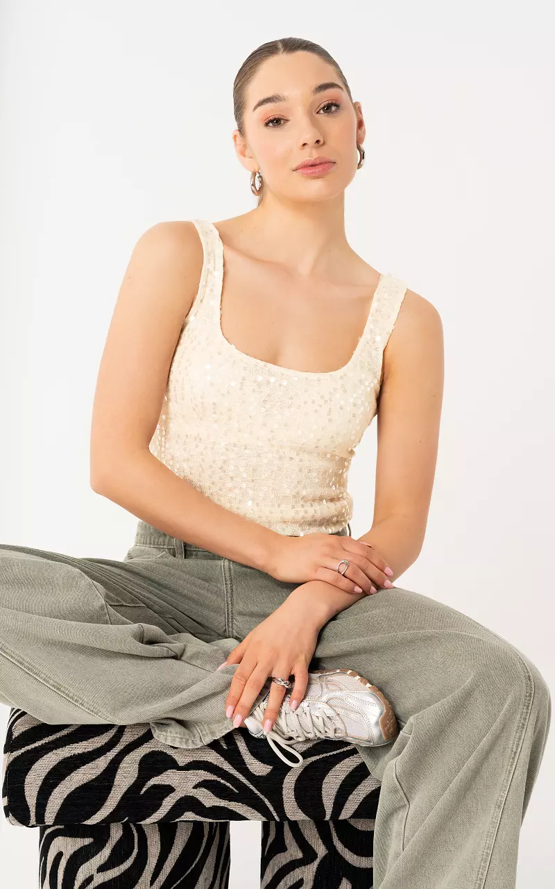 Top mit Pailletten Creme
