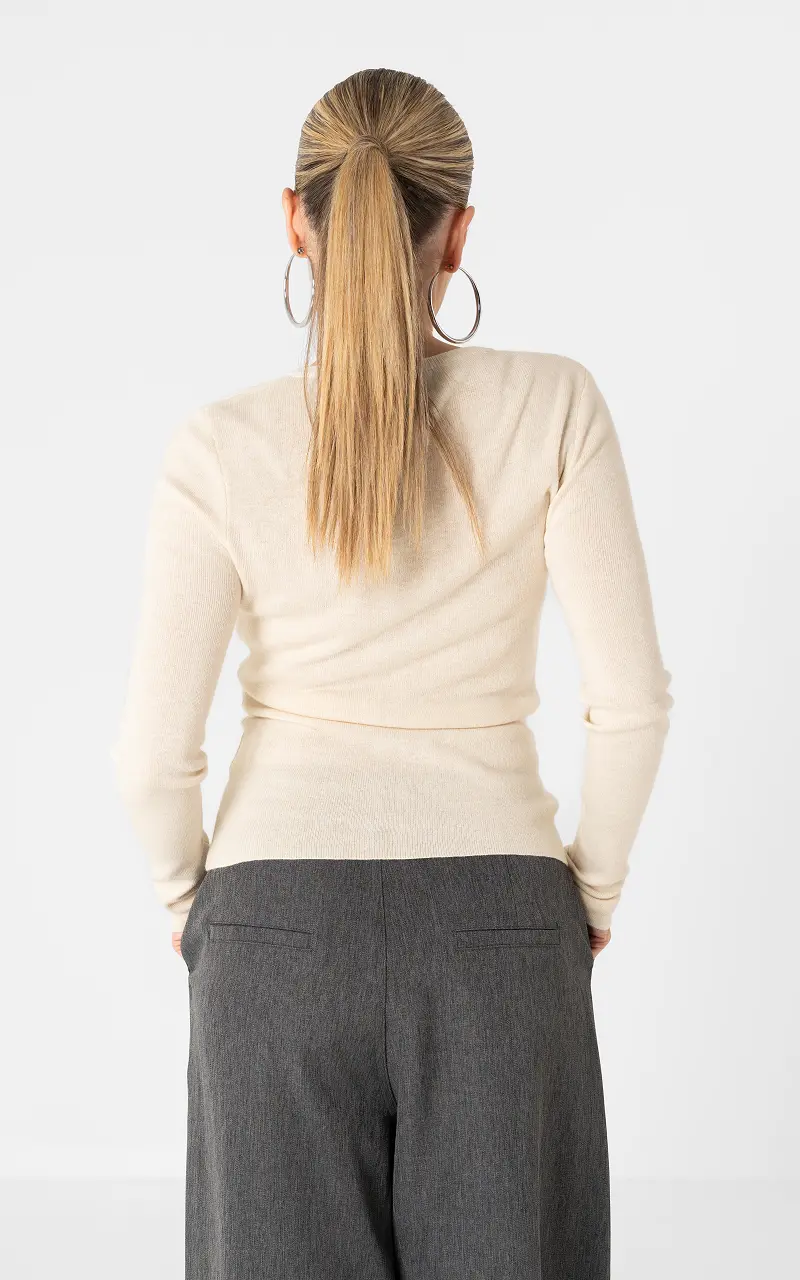 Vestje met knoopjes Creme