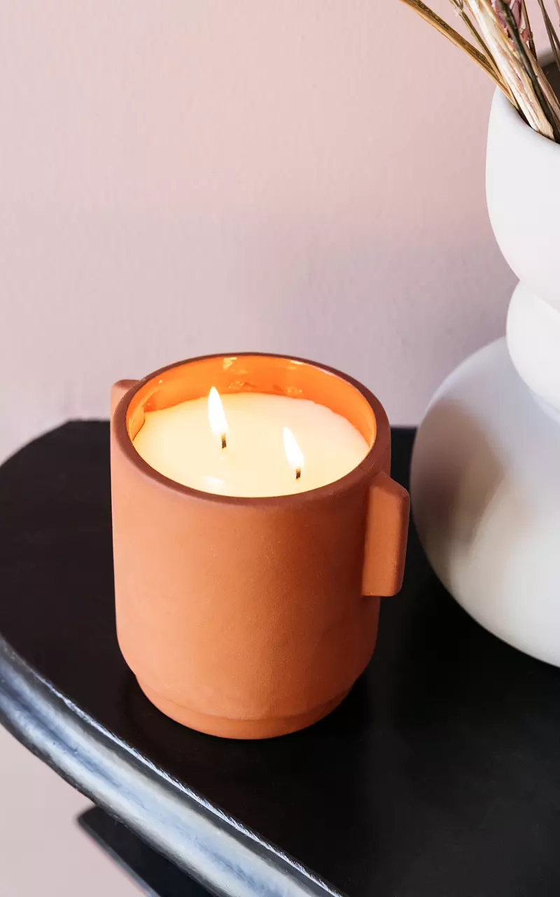 Kerze in Terrakotta-Gefäß Rost