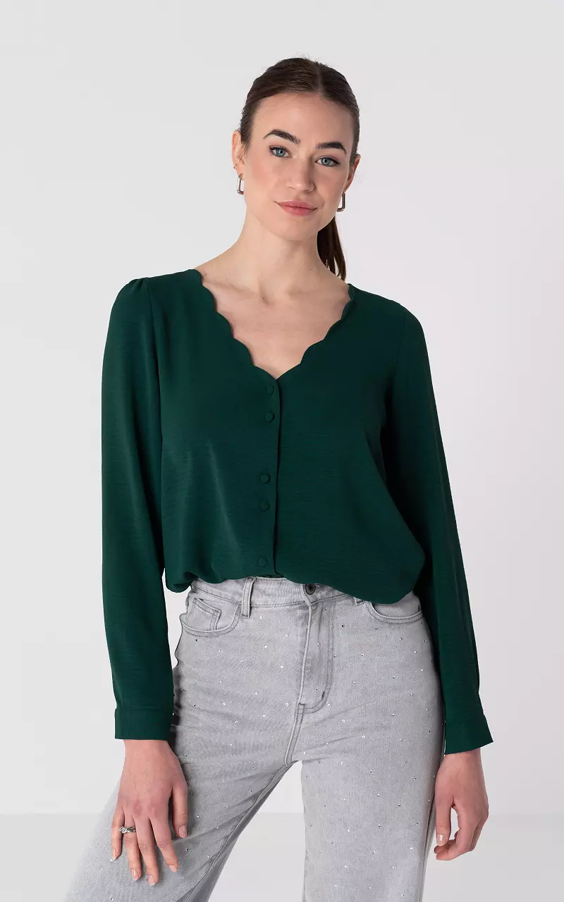 green v neck blouse