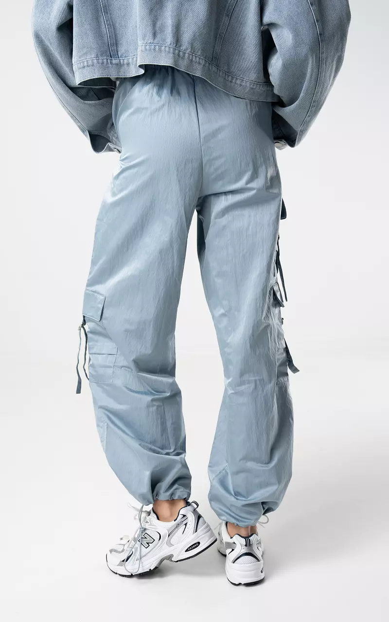 Parachute pants with silver-coloured details