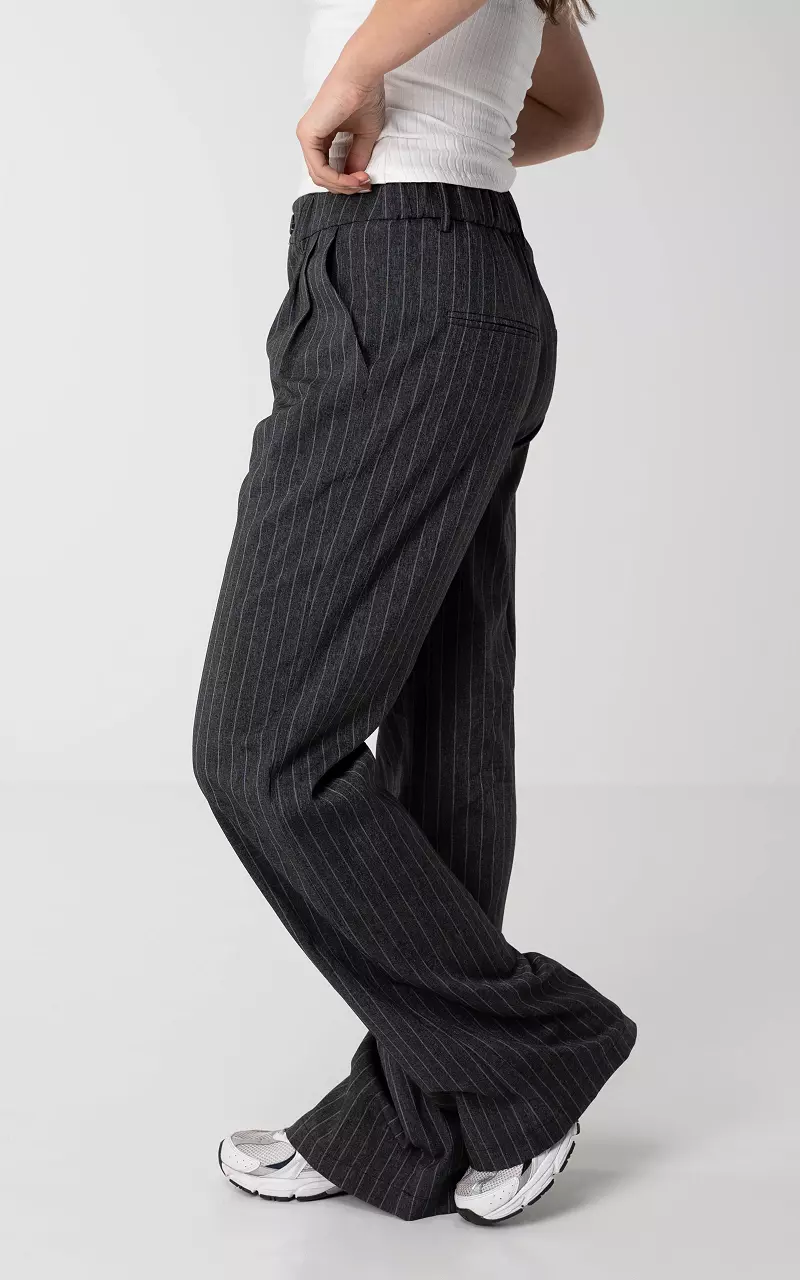 SAINT LAURENT Pleated pinstriped wool straight-leg pants | NET-A-PORTER