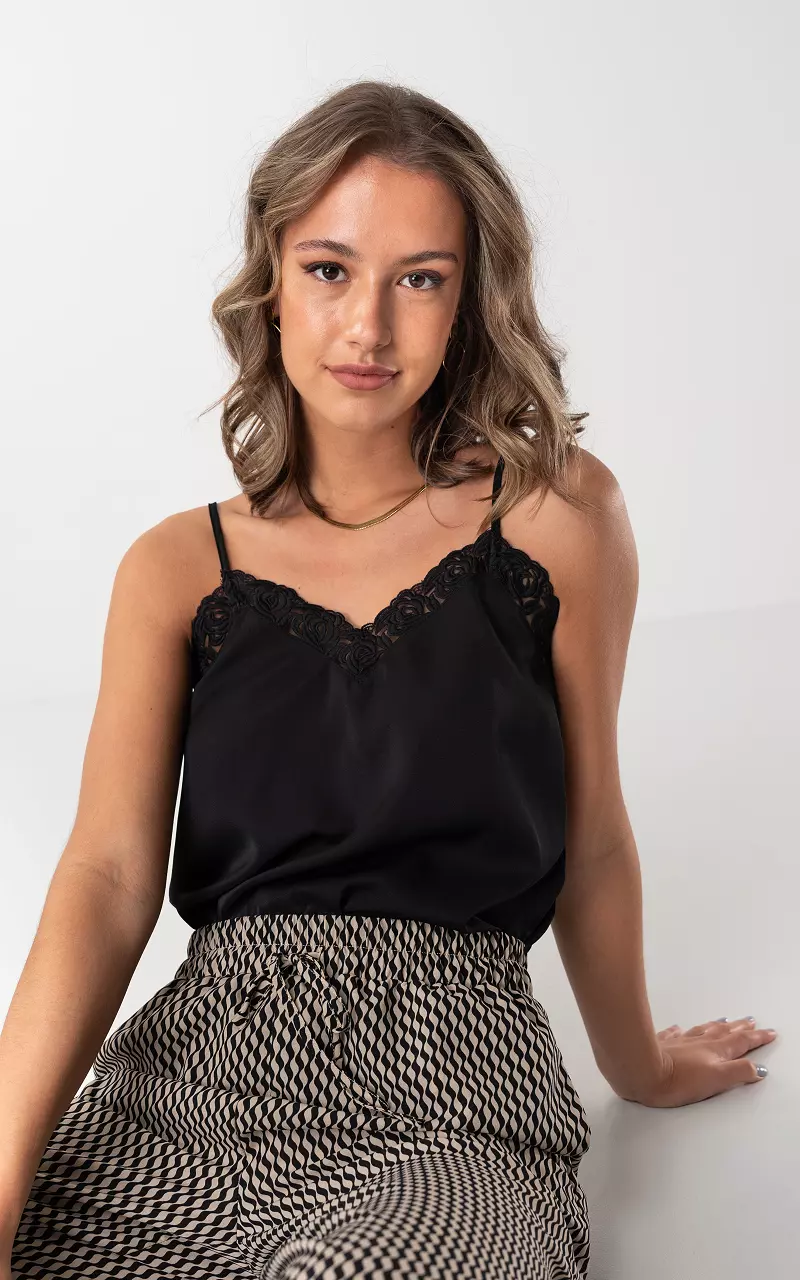 Top with laced details and adjustable straps Black