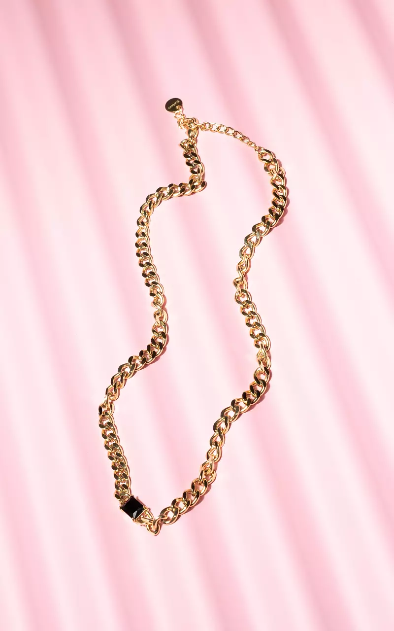 Goudkleurige ketting met zwart steentje Goud Zwart