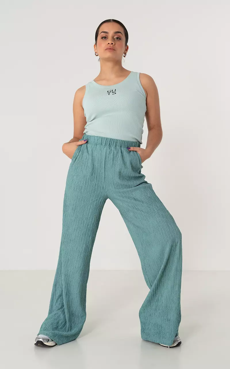 Loose-fitting trousers with pockets Petrol