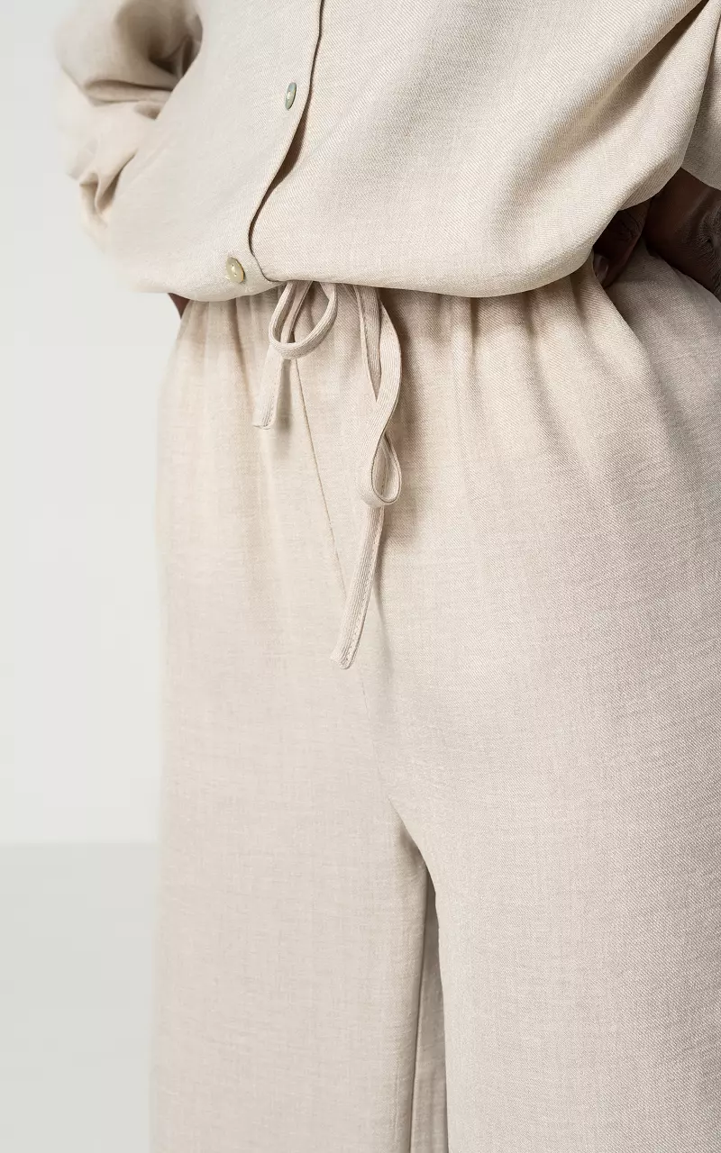 Wide leg trousers with bow detail | Guts & Gusto