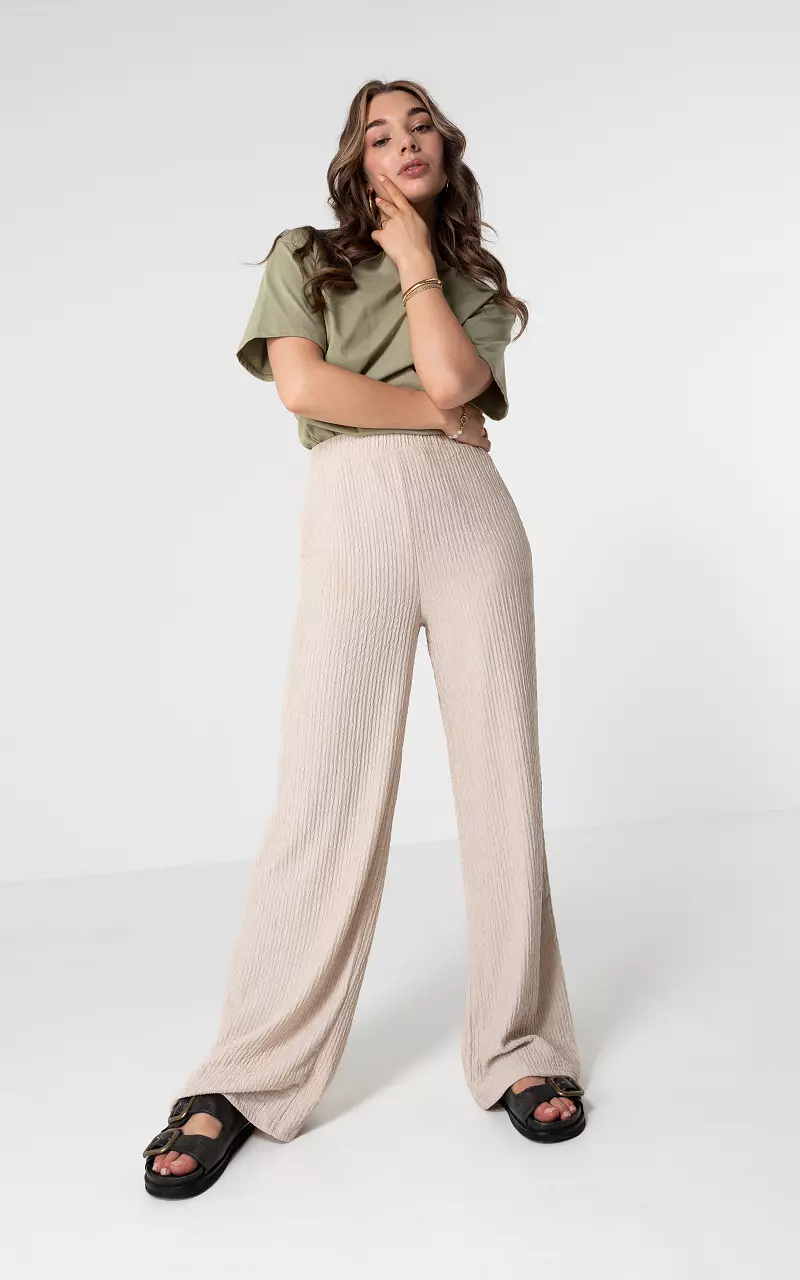 Loose fit model trousers with side pockets Beige