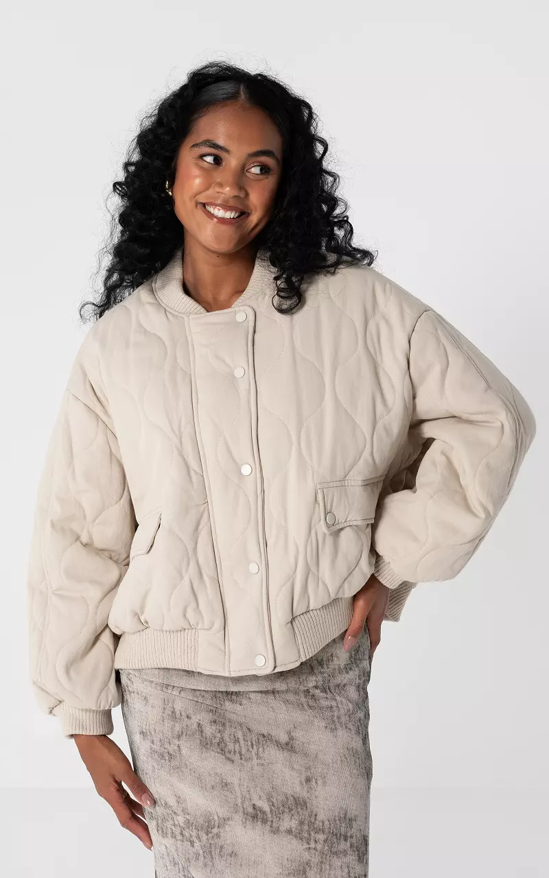 Bomber jacket with press buttons and zip Beige