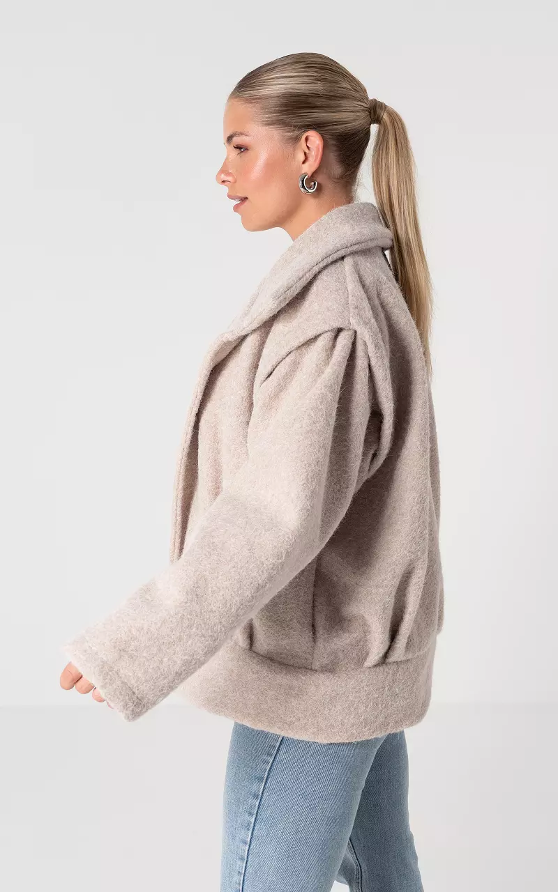 Oversized coat with side pockets Beige