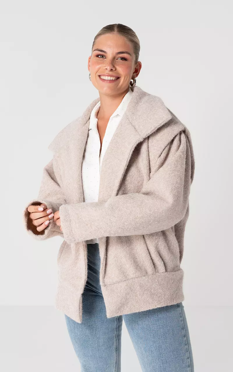 Oversized coat with side pockets Beige