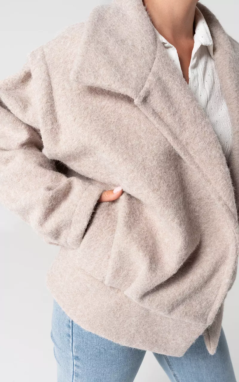 Oversized coat with side pockets Beige