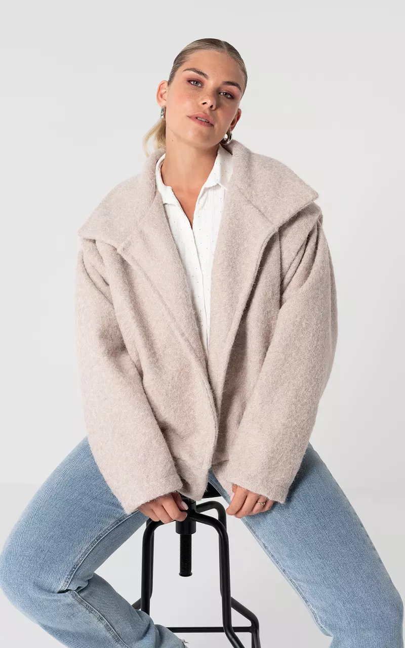 Oversized coat with side pockets Beige