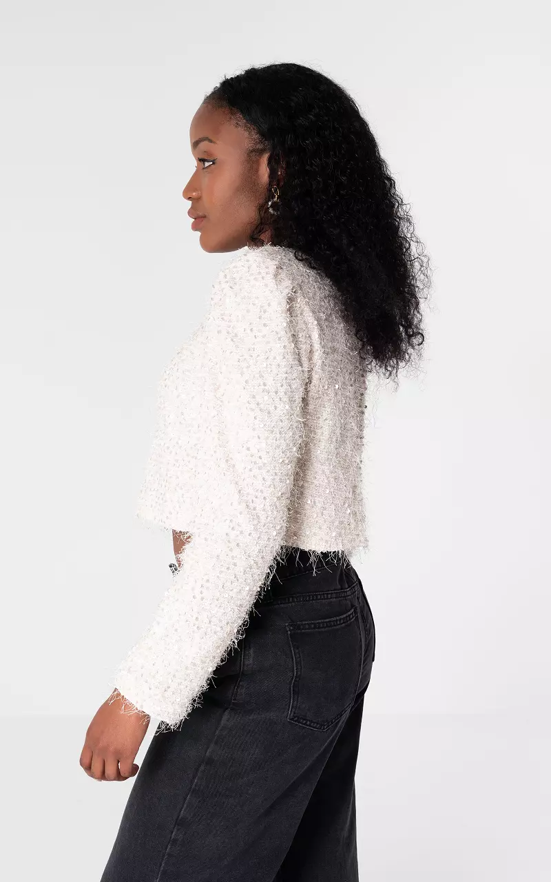 Short top with shoulder pads and sequins Cream