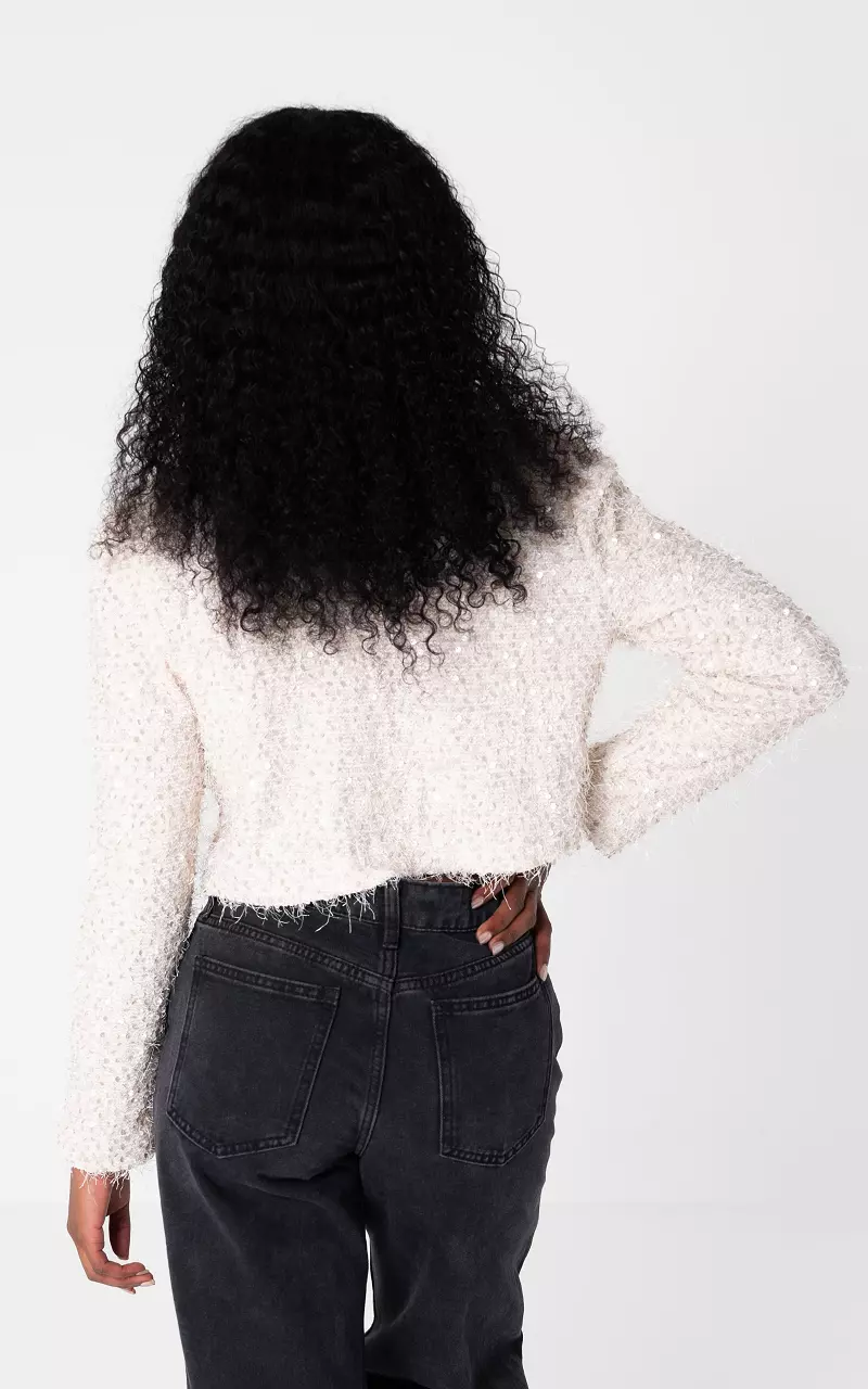 Short top with shoulder pads and sequins Cream