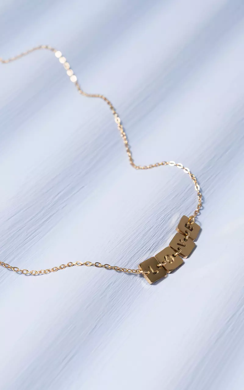 Necklace with the text love Gold