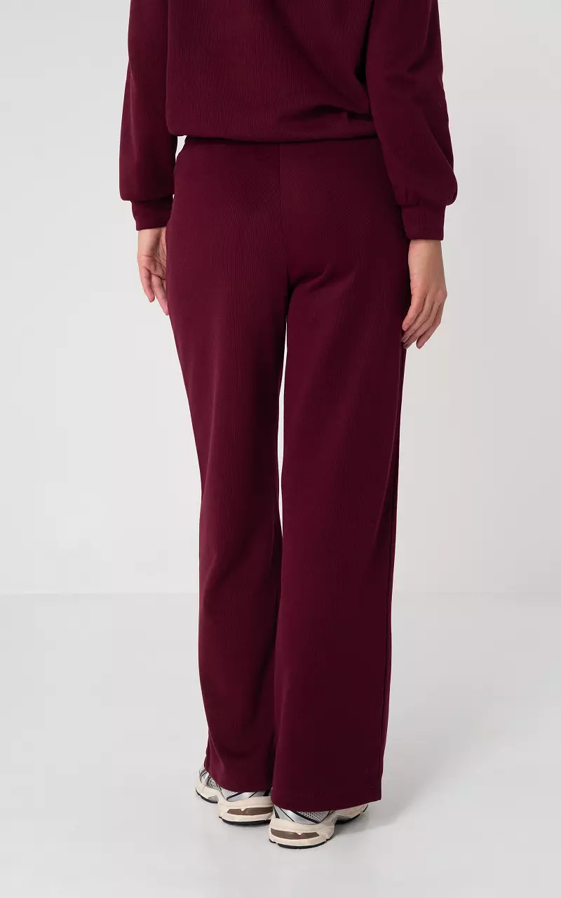 Broek met strikdetail en steekzakken Bordeaux
