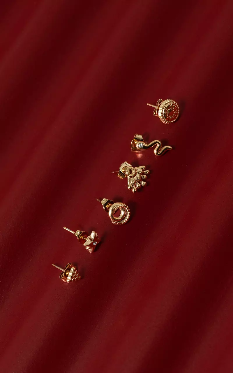 Six different stainless steel studs Gold