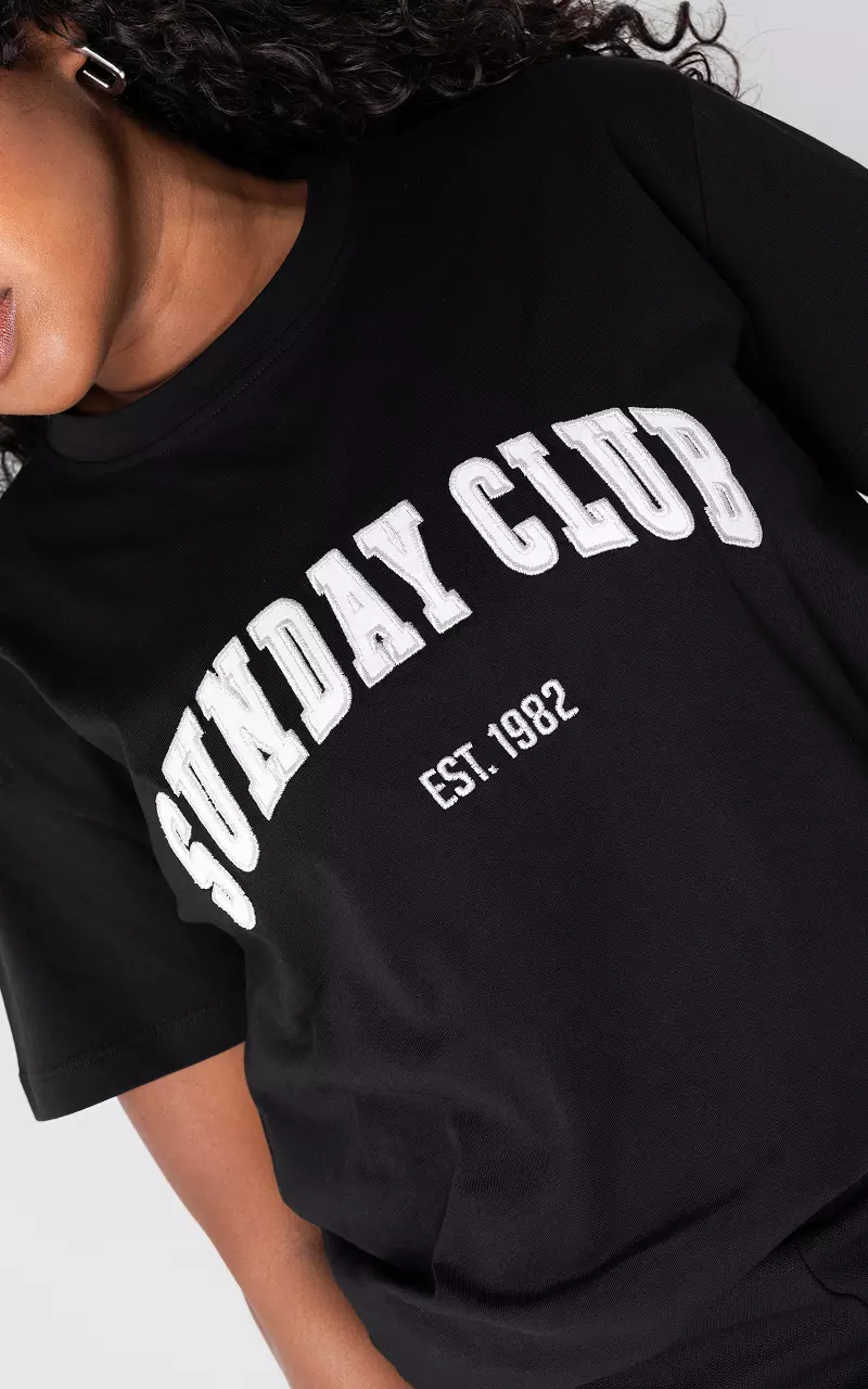 T-shirt met geborduurde tekst Zwart Wit