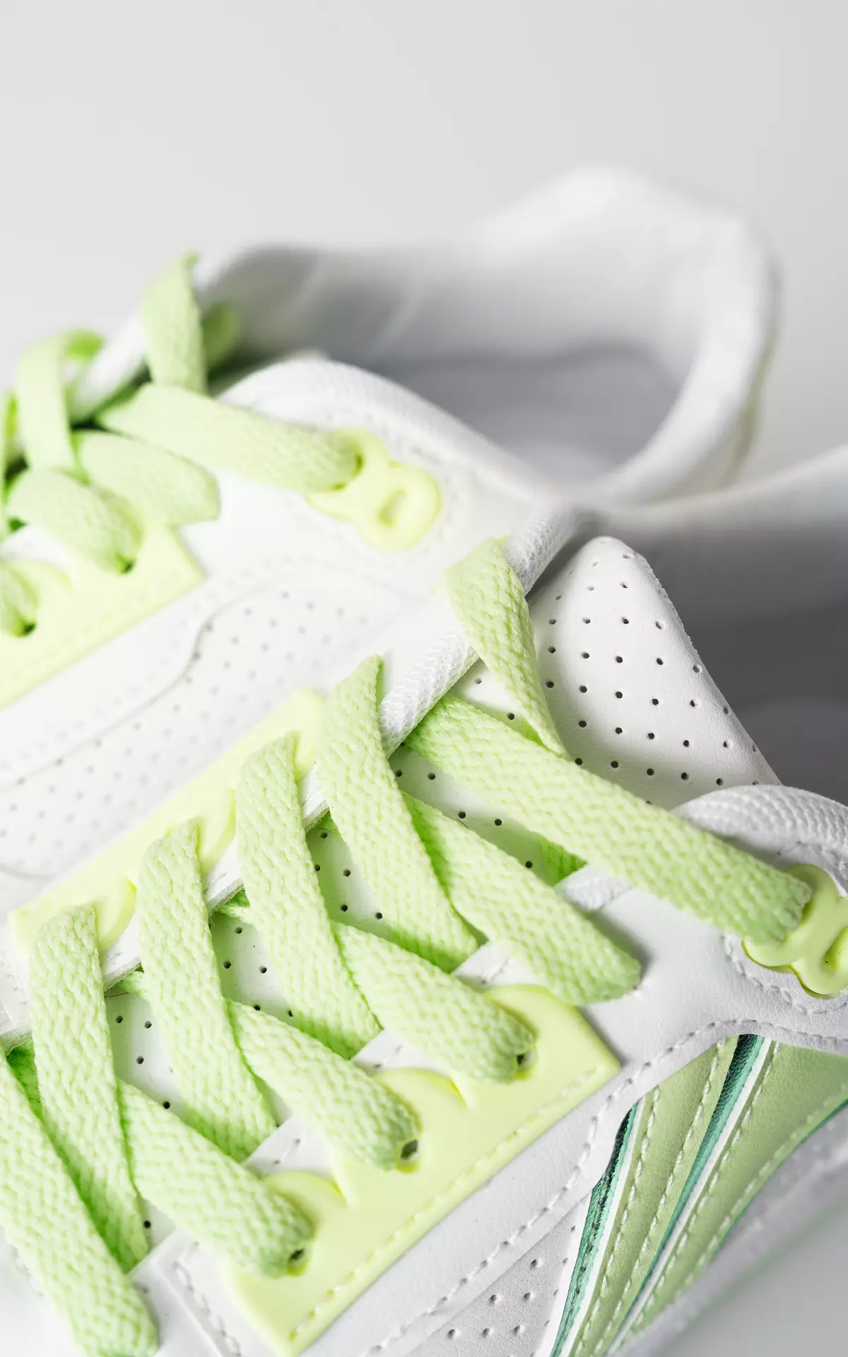 Lime green and store white sneakers