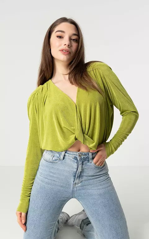 Top with v-neck and shoulder pads lime green