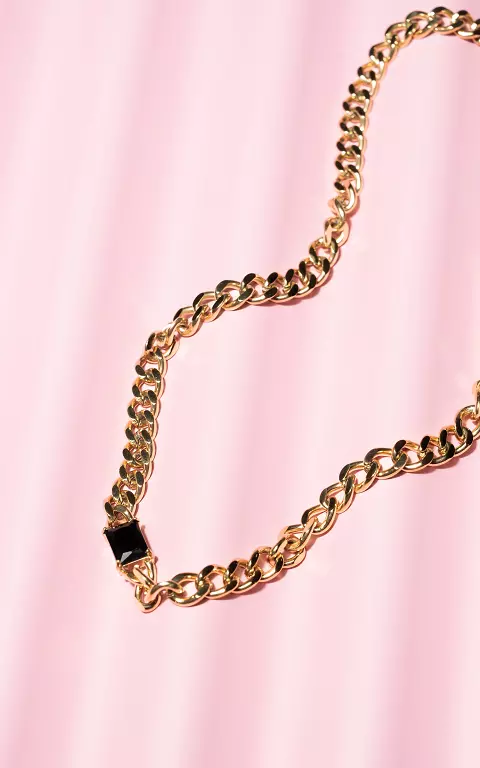 Collier doré à pierre noire or noir