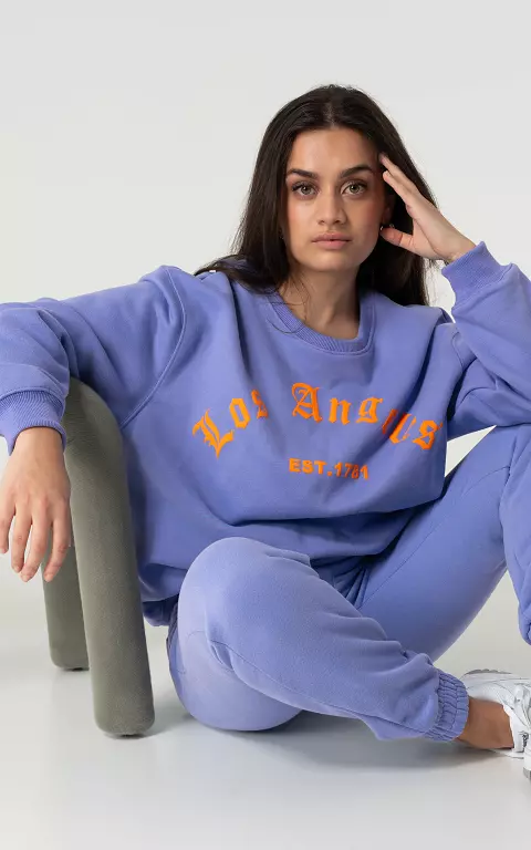 Oversized Pullover mit Print hellblau orange