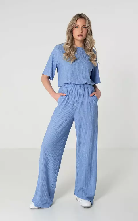 Loose-fitting trousers with pockets light blue