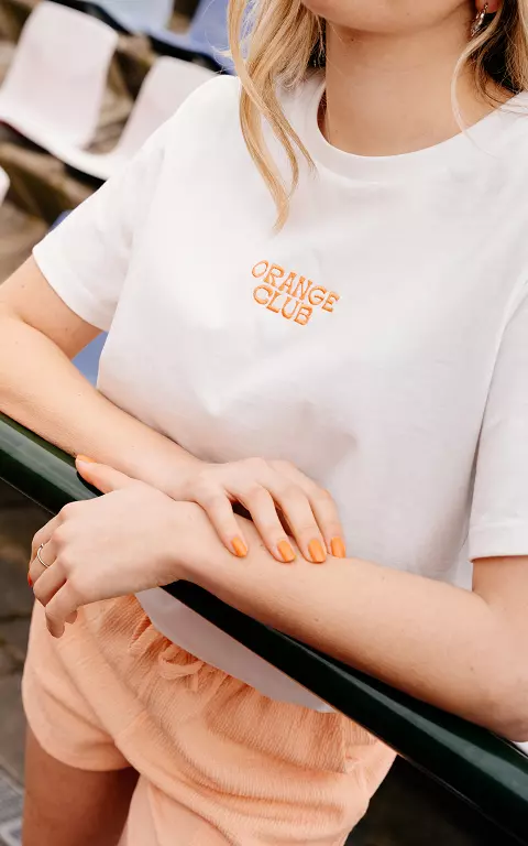 Shirt with embroidered text white orange